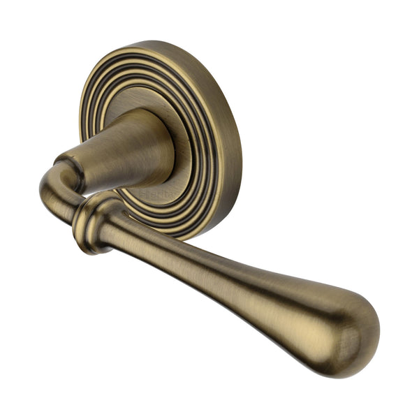 Roma Reeded Door Handle on Round Rose