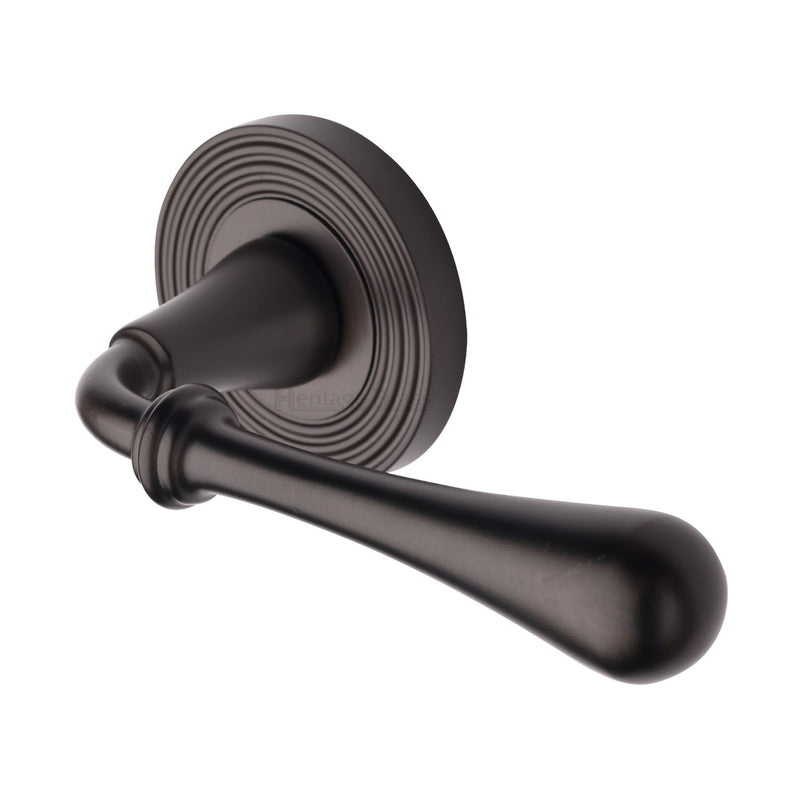 Roma Reeded Door Handle on Round Rose