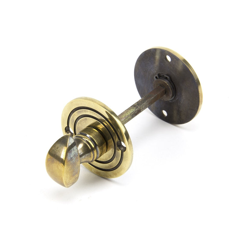 From The Anvil Round Bathroom Thumbturn - Aged Brass