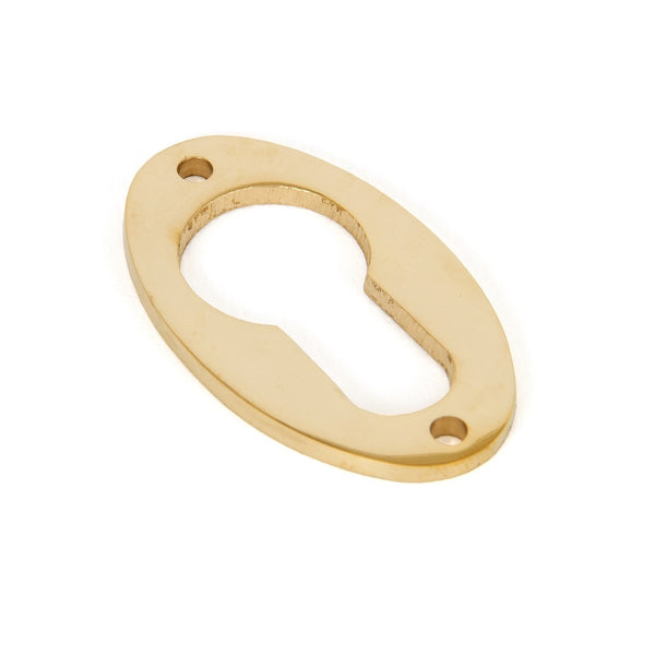 From The Anvil Period Euro Profile Oval Escutcheon - Polished Brass